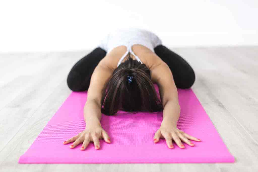 Should You Practice Yoga During Menstruation? | Fitpage Expert Advice